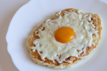 Adjarian khachapuri in a frying pan. Dietary low-calorie khachapuri with cottage cheese dough on a white plate. Proper nutrition. simple breakfast