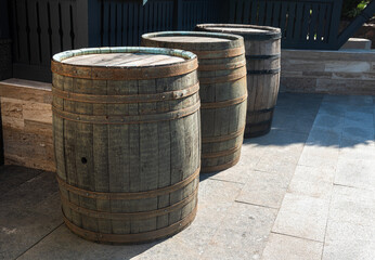Nice wooden barrels for wine or beer sunny day, business