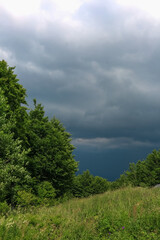 storm clouds over mountains in summer