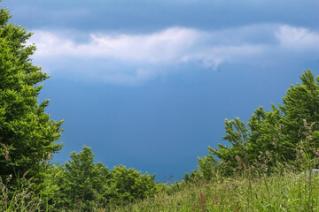 storm clouds over mountains in summer