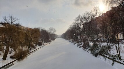 The frozen canal and the sun
