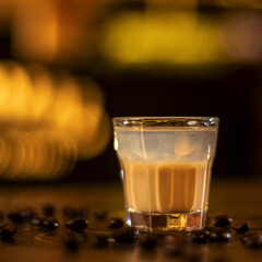 shot of coffee drink, coffee beans on wooden table square