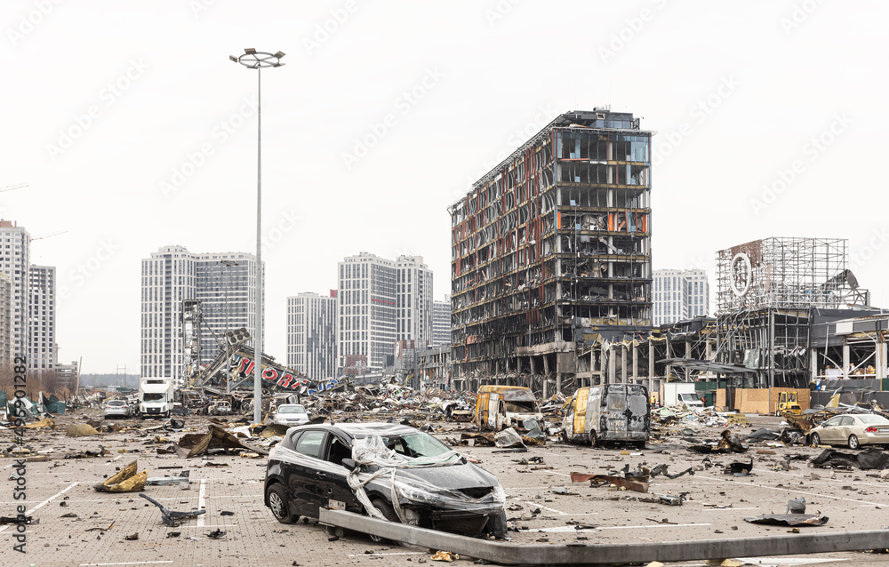 Poster War in Ukraine. Damaged shopping center in Kyiv