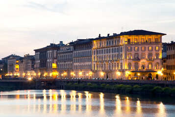 Fototapeta na wymiar Facades along Arno river, on left Amerigo Vespuci bridge, historic part of the city, UNESCO World Heritage site, Florence, Tuscany, Italy, Europe