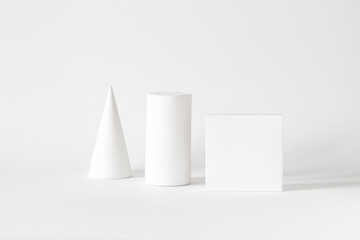Geometric Basic Shapes Still Life. Simple geometric white forms on the white background