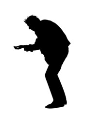 Silhouette of a Bending Beggar