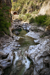 mountain river in the gorge of mountains near the city of San Pelegrino in Italy