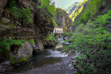 mountain river in the gorge of mountains near the city of San Pelegrino in Italy