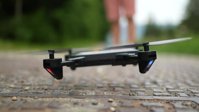 Aerial drone flying off taking off to fly