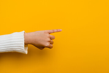 little finger female hand parting little finger on yellow background gesture of promise Ready space for your advertising work. hand contract concept