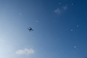 Obraz na płótnie Canvas Drone in Air | Drone in Air with Bubbles | Drohne in der Luft mit Seifenblasen