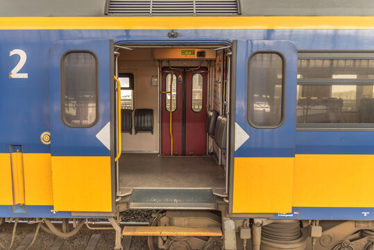 Amsterdam, Netherlands, March 2022. Open and closed doors of a dutch train.