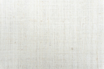 Jute hessian sackcloth burlap canvas woven texture background pattern in light beige cream brown color blank decoration.