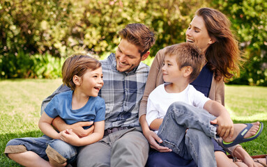 Showing my boys the true meaning of family. Cropped shot of a loving family spending time outdoors.