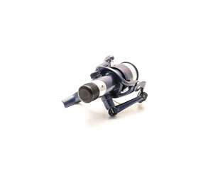 Brand new spinning fishing reel with monofilament fishing lines and rear drag system isolated on...