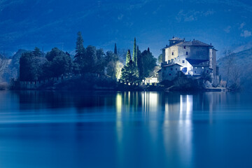 Toblino Castle in the moonlight. Madruzzo, Trentino, Italy