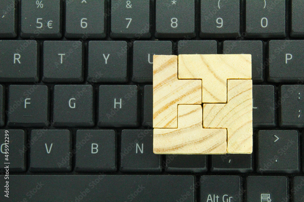 Aufkleber laptop keyboard with puzzles that have been solved or completed in compartments