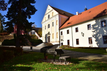 Fototapeta na wymiar Ostrov castle park, Church of the Annunciation of the Virgin Mary