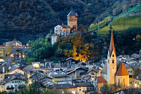 The village of Chiusa and the Branzoll castle in autumn. Isarco valley, Bolzano province, Trentino Alto-Adige, Italy, Europe.