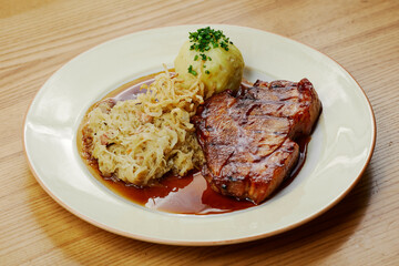 barbecue roast pork with mashed potatoes and fried onions