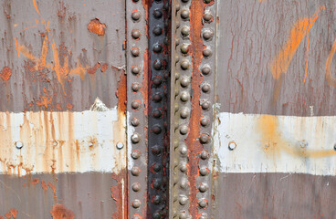 Close Up of Rust and Rivets on Old Steel Railway Bridge 