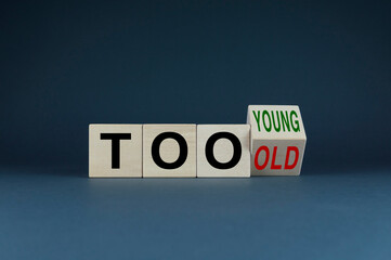 Cubes form words Too young or too old. Concept of age discrimination - social problem - obrazy, fototapety, plakaty