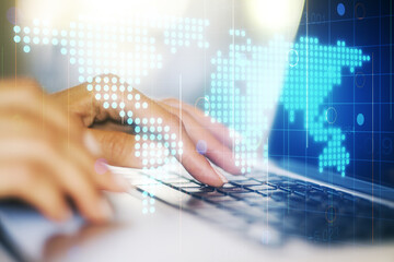 Multi exposure of abstract graphic world map and hands typing on computer keyboard on background, big data and networking concept