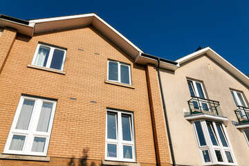 Fototapeta na wymiar Modern new apartment flat housing for first time buyers seeking home ownership in Cardiff Wales UK, stock photo image