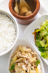top view fast food with shredded boiled chicken and vegetable and soup vertical composition