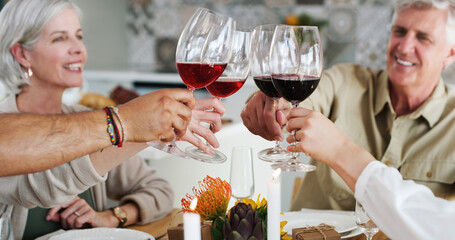 Heres to friends who feel like family. Shot of two happy couples sitting down for lunch and...