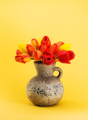 Beautiful bouquet of colorful tulips in vase