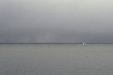 boat on the sea in cloudy weather
