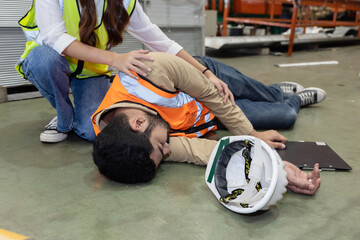 Unconscious Asian Engineer Worker Getting First Aids Help From His College