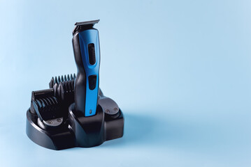 Modern Battery Electric Shaver for Man on Blue Background with Clipping Path Horizontal Copy Space