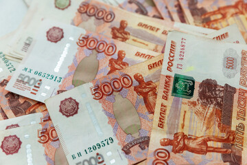 A bunch of banknotes of 5000 rubles. Financial crisis and savings. Close-up.
