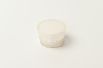 moisturizing cream bottle over white background studio, packing and skincare beauty concept