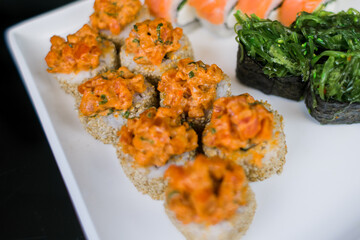 a sushi rolls on a plate japanese cuisine delivery