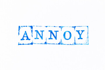Blue color ink rubber stamp in word annoy on white paper background