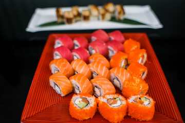 a set of sushi rolls from fish and seafood a set of different videos japanese cuisine delivery