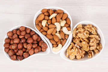 Various nuts and almonds containing healthy natural vitamins and minerals, nutritious eating