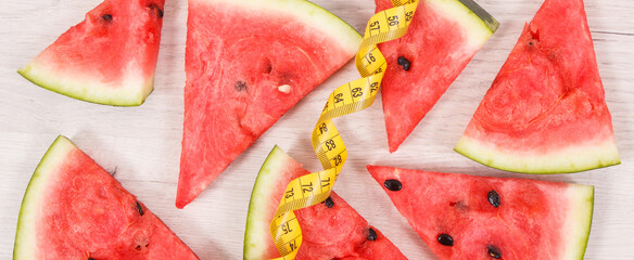 Watermelon and centimeter, concept of healthy nutrition, slimming and fruit containing minerals