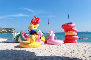 red flip flops on the beach