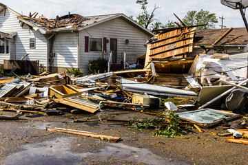 EF3 tornado damage touched down in a residential neighborhood causing millions of dollars in damage.