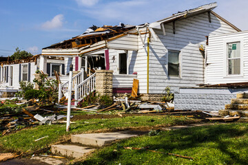 EF3 tornado damage touched down in a residential neighborhood causing millions of dollars in damage.