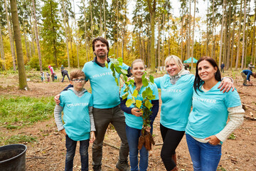 Happy family with children as environmentalists team