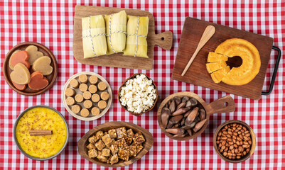 Typical brazilian june festival food over red plaid fabric. Festa junina