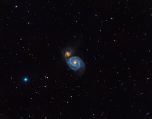 Obraz na płótnie Canvas The colorful Whirlpool galaxy