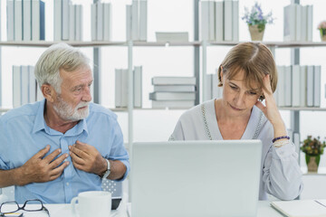 Fototapeta premium Stressed husband, wife senior couple elderly family, caucasian mature, retired calculate budget from invoice, expense or bill, no money to pay. Mortgage, loan causing debt, bankruptcy of financial.