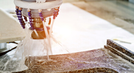 Close up of CNC machine working on the rock