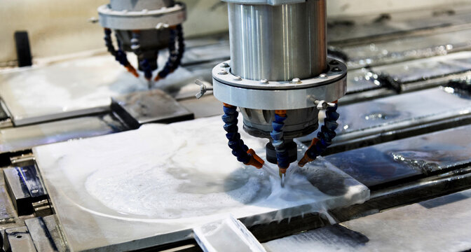 Close up of CNC machine working on the rock